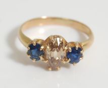 A 19th Century Victorian ladies 18ct gold ring being set with an oval cut brown diamond flanked by