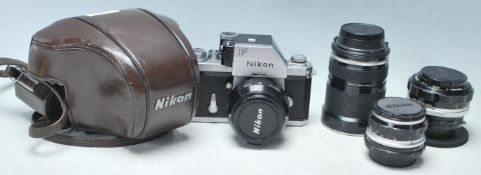 A good vintage 20th century NIKON F 35mm camera serial number 6919664 with Nikkor-H Auto 1:2 f=