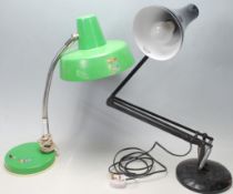 An amazing retro 20th century black anglepoise lamp / desk lamp with circular base, together with