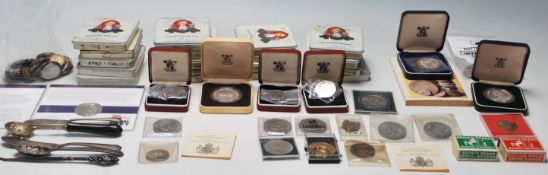 A collection of coins to include a selection of Great British commemorative crowns, Royal Navy