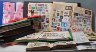 A large collection of vintage all-world stamp albums consisting of various albums being home made