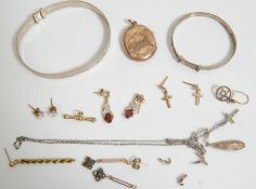 A collection of antique and later jewellery to include a pair of crucifix earrings (stamped 375 to