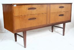 A retro vintage teak wood sideboard / chest of drawers in the manner of G Plan. Having two over