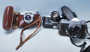 A group of three vintage 20th century 35mm cameras to include Pentax Asahi photograph camera with