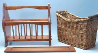 A retro 20th century French wicker baguette basket of rectangular form having dipped centre and