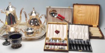 A good collection of 20th century silver plate boxed flatware sets and a boxed full four pice tea