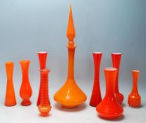 A mixed collection of retro vintage late 20th Century studio glass ware in burnt orange to include a
