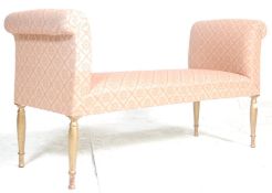 A 19th century revival French window seat. The Louis 16th revival window seat being raised on gilded