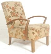 A 1930's Art Deco fireside bentwood armchair in the manner of Heals of London. The armchair with