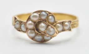 A 19th Century Victorian knot design ring being set with half pearls in a ribbon style mount with