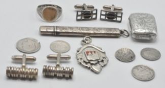 A collection of silver and jewellery items to include a silver hallmarked vesta case with