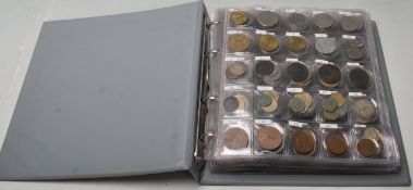 An album of mixed world coins to include four Roman examples, an 1808 East India Company X cash