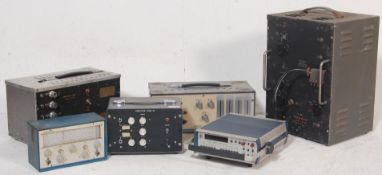 A mix group of amps and radio receivers to include Amplifier DS50-02, Amplifier DS5-150W,