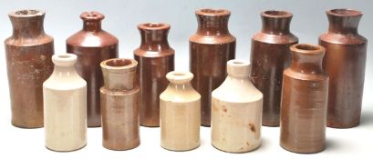A mixed collection of early 20th Century Doulton Lambeth style stoneware flagons / drinking vessels.