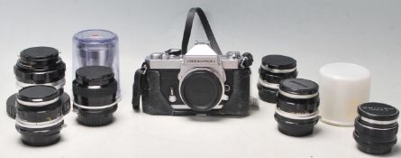 A 20th century vintage NIKKORMAT FT3 camera No 6038058 along with Nippon Kogaku Japan No 235974