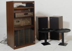 A retro vintage music cabinet comprising of a Pioneer SA - 510 stereo amplifier, a Pioneer Stereo