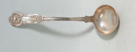 A 19th Century Victorian hallmarked sterling silver ladle having shell and foliate decoration to the