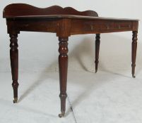 A 19th Century Victorian mahogany buffet de corps / serving table having a serpentine galleried back