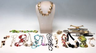 A collection of vintage ladies costume jewellery to include as selection of ladies beaded