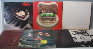 A collection of vintage 12” vinyl rock records to include The Stranglers - live X cert, The