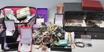 A group of vintage costume jewellery to include a collection of ladies stud earrings, various