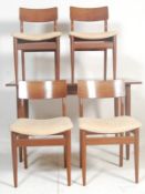 A retro vintage 1970s teak wood Danish inspired dining suite comprising of a rectangular