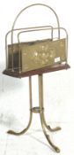 An early 20th Century Arts and Crafts free standing letter rack having brass repousse decorated side