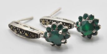 A pair of silver 925 hallmarked drop earrings set with marcasite's and faux emeralds. Measures: 2.
