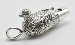 Hunting interest- A sterling silver whistle pendant in the form of a duck. Stamped 925 sterling.