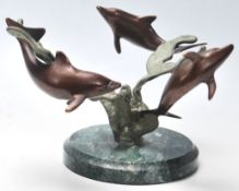A good quality late 20th Century vintage bronze statue of three dolphins swimming round seaweed on a