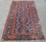 An early 20th century Persian / Islamic Bokhara floor rug – carpet. The rug being handwoven with a