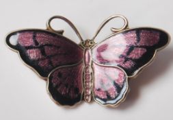 A 20th Century David Andersen Norwegian silver butterfly insect bug brooch having pink and black