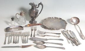 A collection of hallmarked sterling silver and silver plated items to include a perfume bottle, a