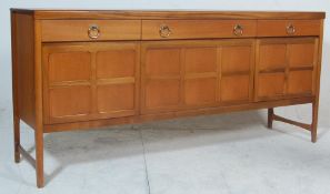 A vintage 20th Century 1970's retro Nathan Long John teak wood sideboard credenza raised on shaped