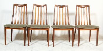 A set of four retro mid 20th Century G plan Fresco range teak framed rail back dining chairs