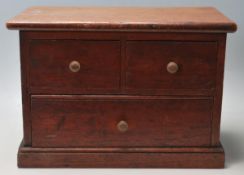 A good early 20th century antique desktop oak cabinet / fining cabinet having two short drawers over