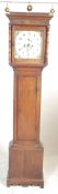 A 19th century George III oak West Country painted face longcase - grandfather clock by Hancock of