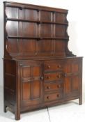 A 20th century Ercol dark Jacobean revival - Old Colonial beech and elm wood dresser having
