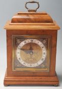An Edwardian early 20th Century oak cased Elliot mantel clock, retailed by Garrard & Co Ltd,
