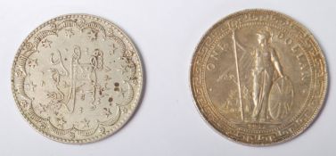 A 1911 One Dollar United Kingdon Trade Dollar being Bombay Mint stamped dating 1911 with Brittania