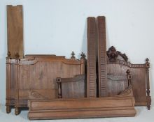 Two 19th century French walnut / fruitwood beds. Each with panelled head and footboards having