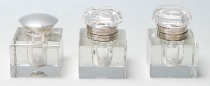 A good early 20th century vintage silver hallmarked glass and silver mounted inkwell. Hallmarks