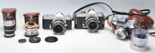 A group of vintage 35mm cameras to include : NIKKOTMAT FT No 4526994 with Nikon Nikkor-H Auto 1:2