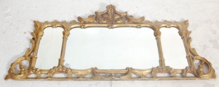 A 19th Century Regency gilt moulded mantel mirror having three mirror panels the frame being moulded