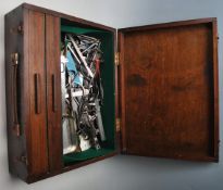 An early 20th century engineers field toolbox with drop down hinged front, two drawers to interior