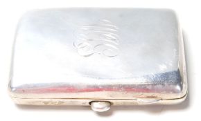 An early 20th Century Edwardian silver hallmarked cigarette case having engraved initials W J G to