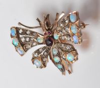 A 19th Century Victorian gem set butterfly insect bug brooch the wings being set with opal
