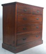 An Edwardian walnut 2 over 3 chest of drawers. Raised on a plinth base with 2 short over 3 deep