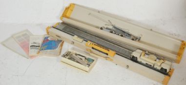 A vintage Empisal Knitmaster model 321 knitting co