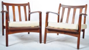 PAIR OF TOOTHILL AFROMOSIA WOOD ARMCHAIRS RETAILED BY HEALS